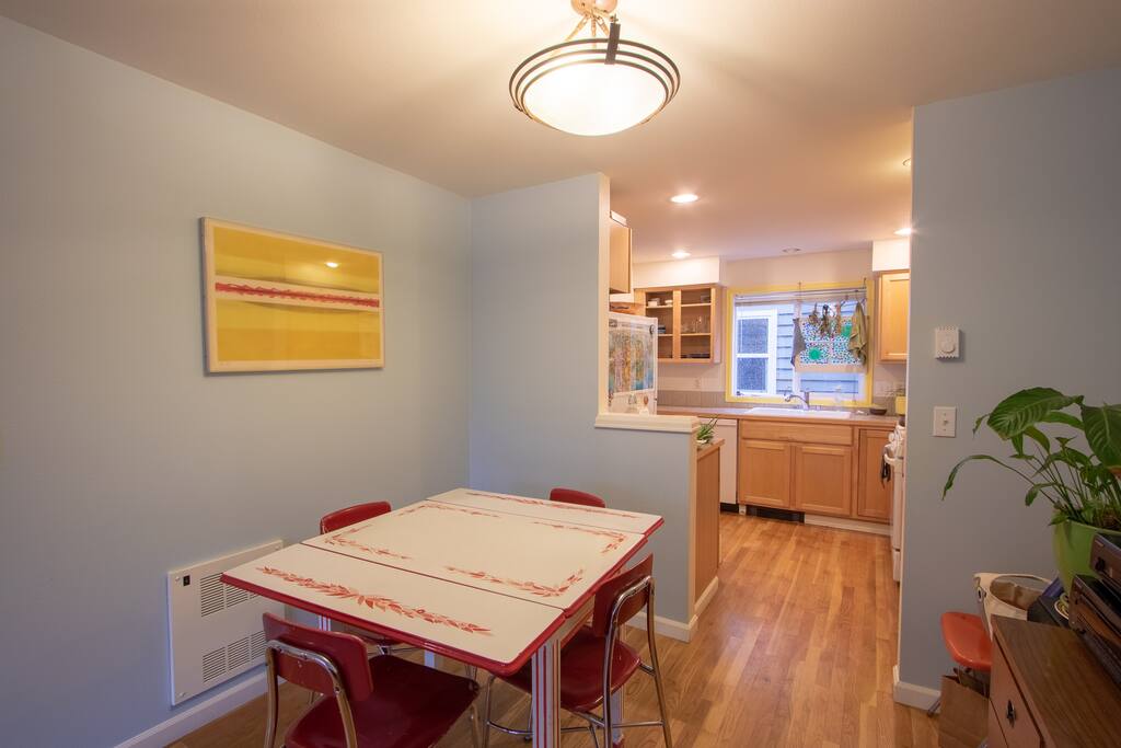 Our little dining area. The stereo is nearby to set the ambience for a nice dinner with the family. There are games and arts and craft supplies in the console. And if you have Spotify, you can connect it to our flat-screen TV.
