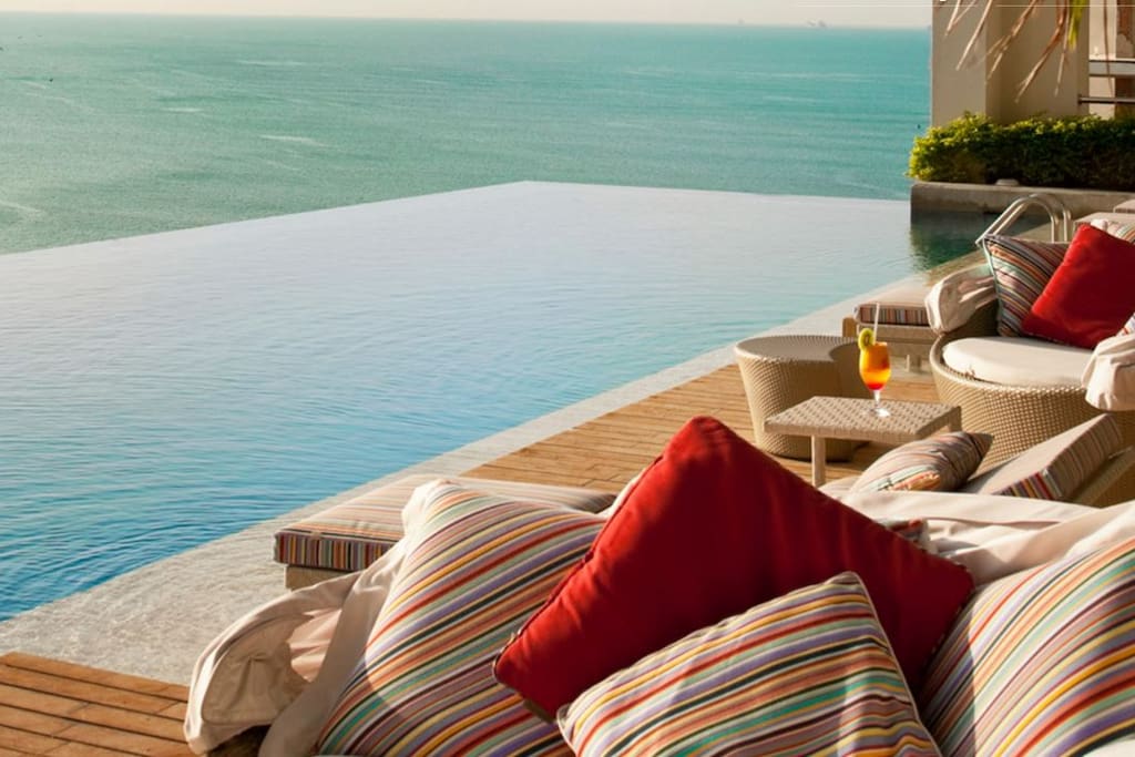 Cabanas and lounges in the Pool area with Restaurant Service