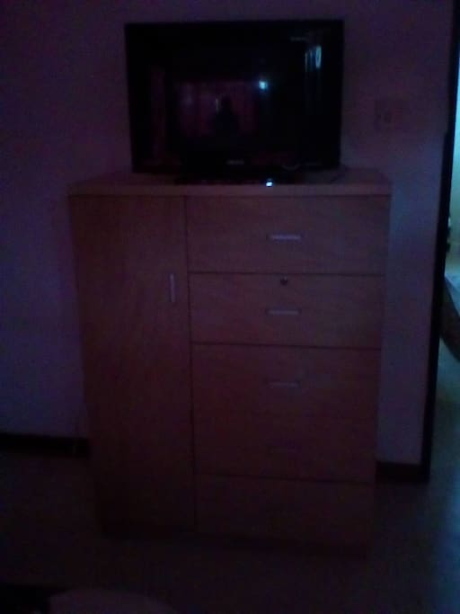 Chest of drawers and Tv
