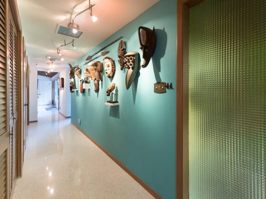 Entry hallway which displays our collection of African masks