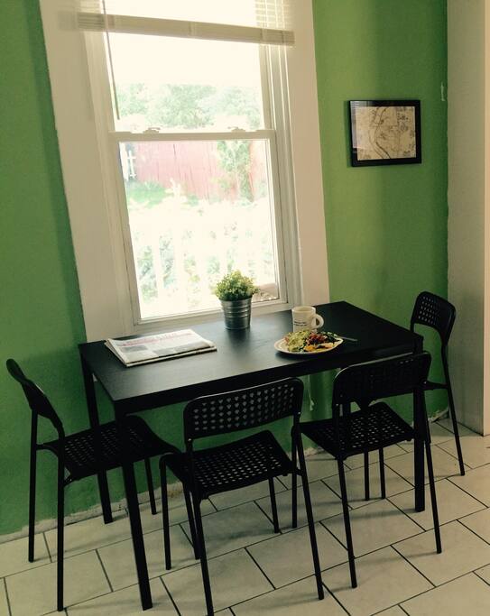 The kitchen is shared and includes a fridge, microwave, coffee maker, stove, oven, and waffle maker.