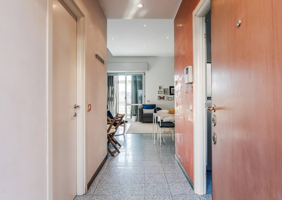 The Hallway - The Kitchen on the right, The Bathroom on the left & The Living room in front of you