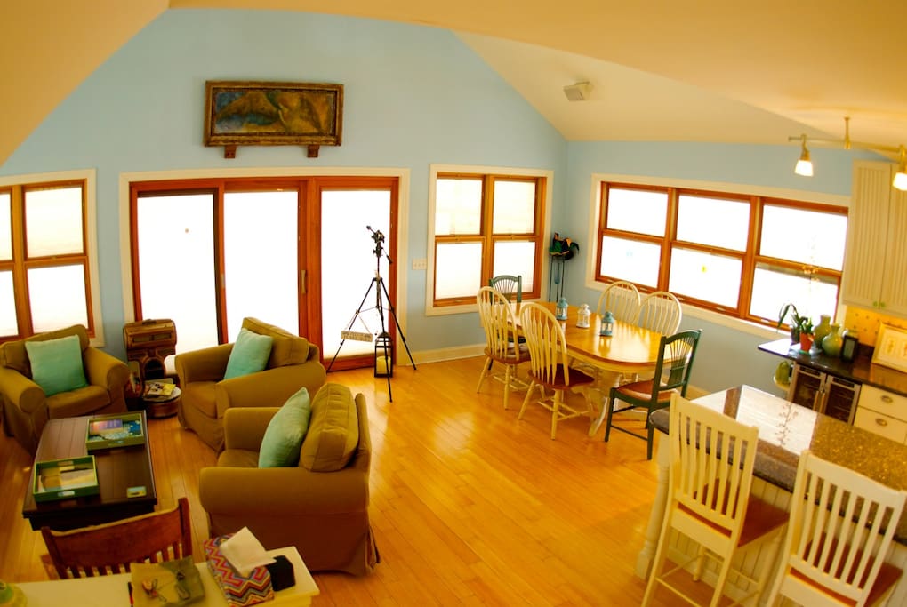 Main gathering area has windows open to river, beach & marsh.