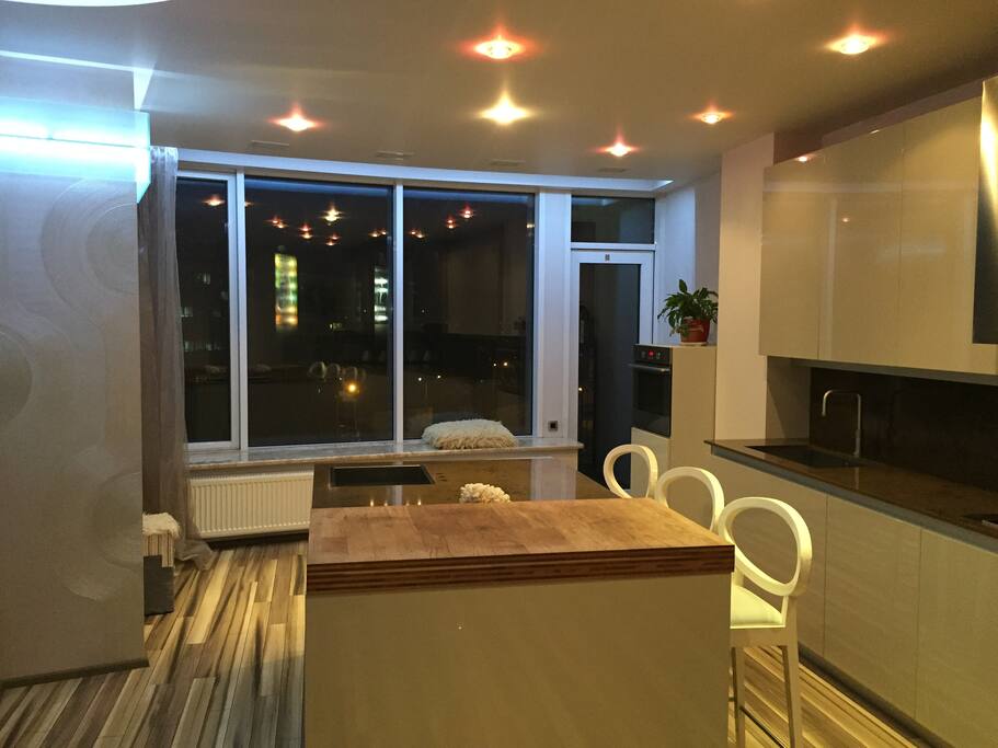 Kitchen + living room + balcony