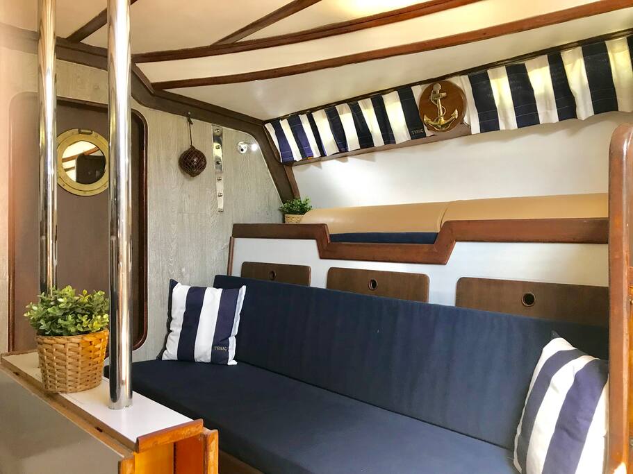 Living room with TV and two comfortable sofa