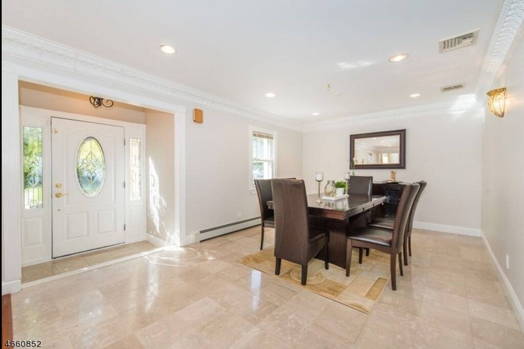spacious well lit living room entrance