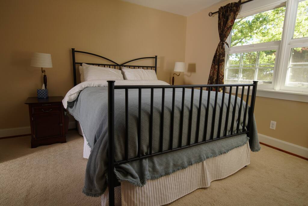 Master Suite bedroom; double doors (to the left) separate the sitting area from the bedroom.