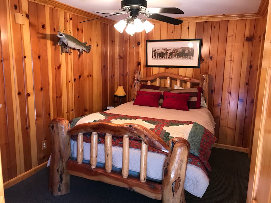 Master bedroom with reclaimed wood walls