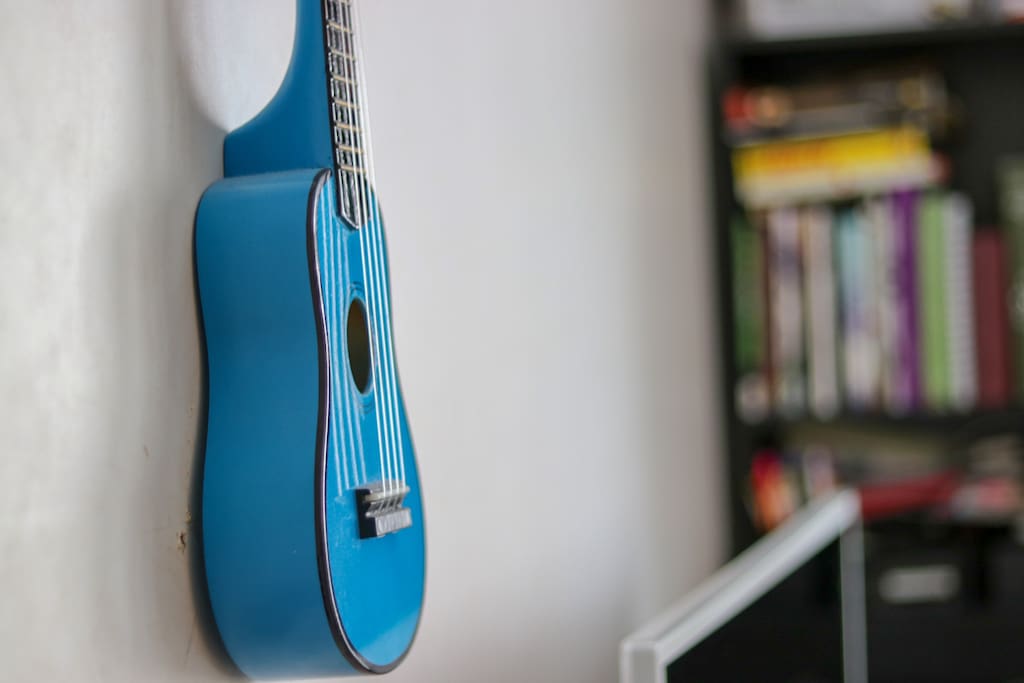 A decorative blue Ukulele