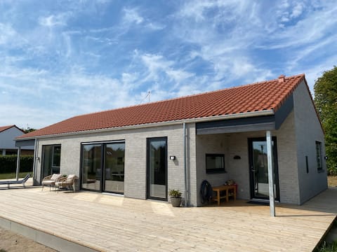 New cottage close to beach with indoor spa