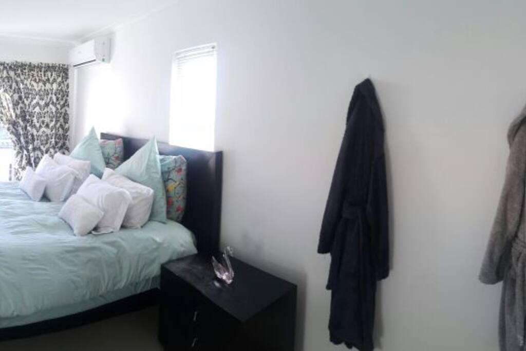 Panoramic view of the main bed showing balcony where you ca£8
n sit and unwind with a glass of wine.