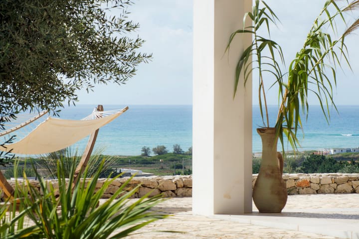 Villa with sea view in mediterranean garden