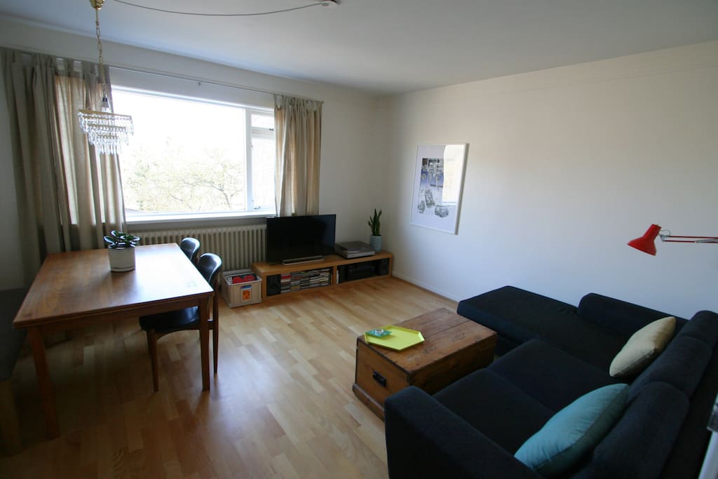 Living room with a dining area.