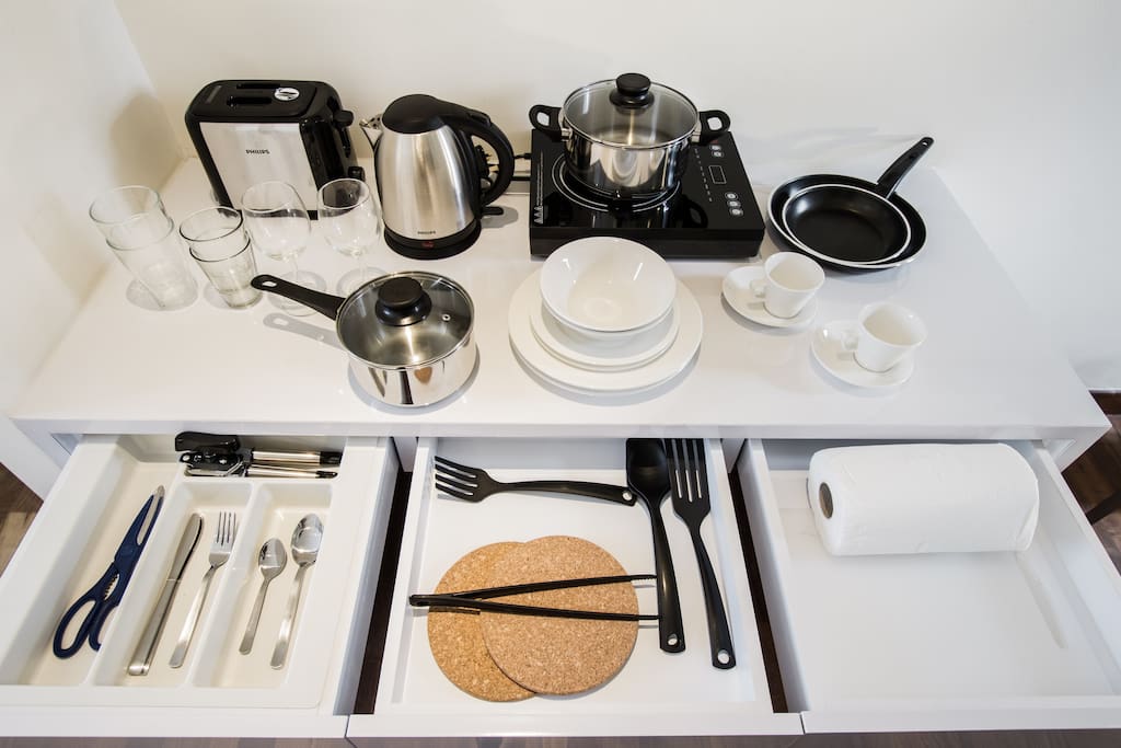 Kitchenette with fridge, microwave, kettle and toaster
