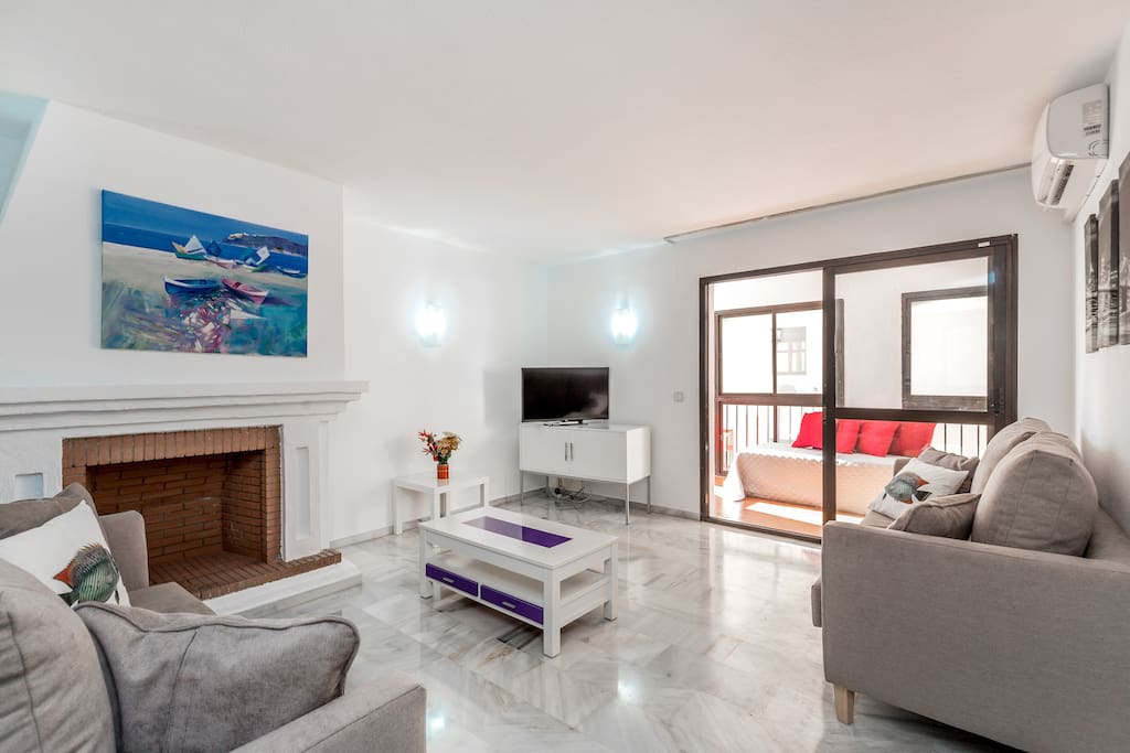 Living room with flat screen tv, 1500 TV channels, fiber optics internet and fireplace