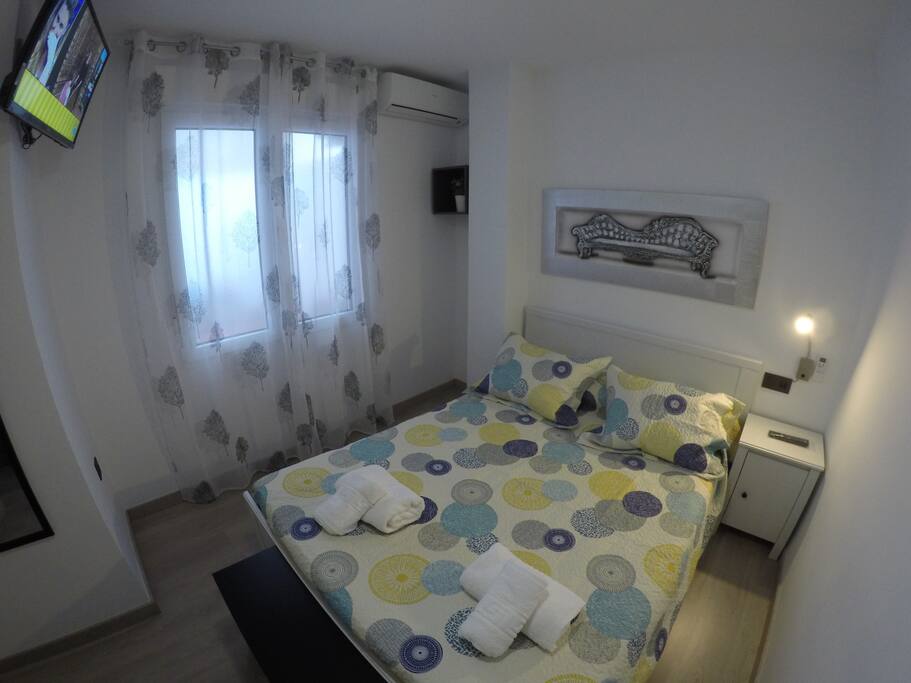 Dormitorio, aire acondicionado.