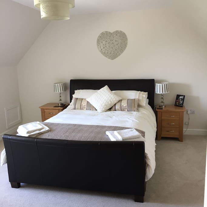 Spacious double ensuite bedroom with king size bed