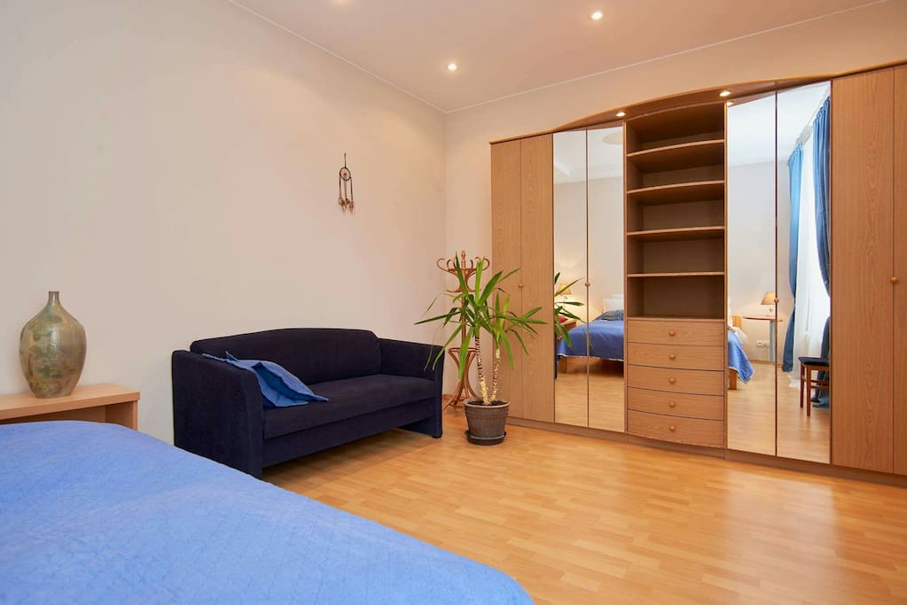 That sofa in big bedroom transforms to bed