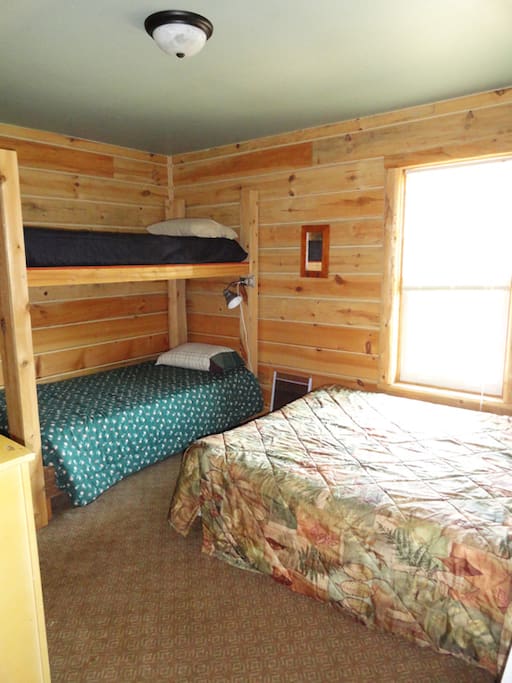 8 bedrooms with a queen bed and twin bunks in each