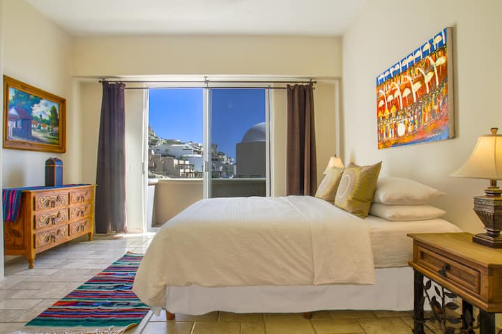 Upstairs Bedroom with Queen Bed with partial water view and shared bathroom with bedroom #3