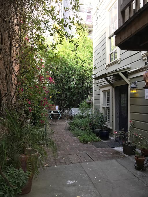 Front door to the AirBnB unit and part of the back yard