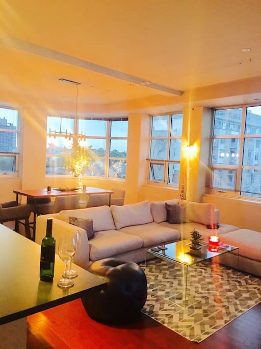 The main living area has dimming industrial lights and candles for a romantic evening