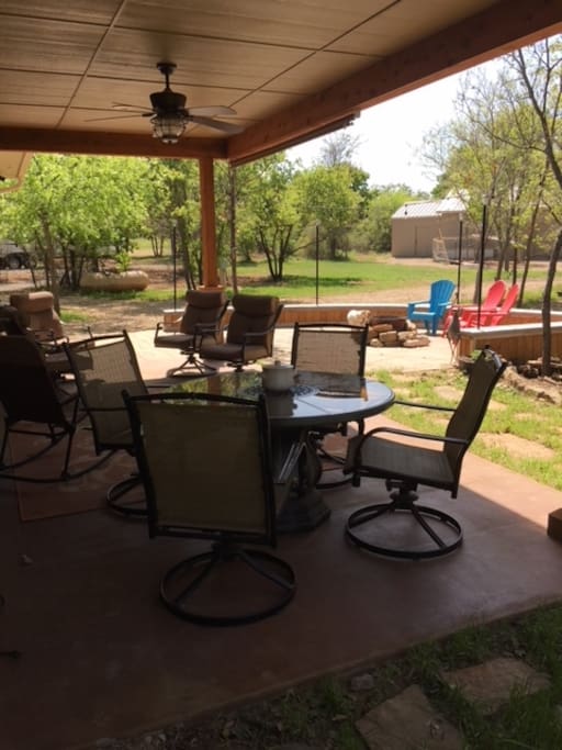 Covered Patio overlooking pond. Join Hosts for late afternoon gathering.