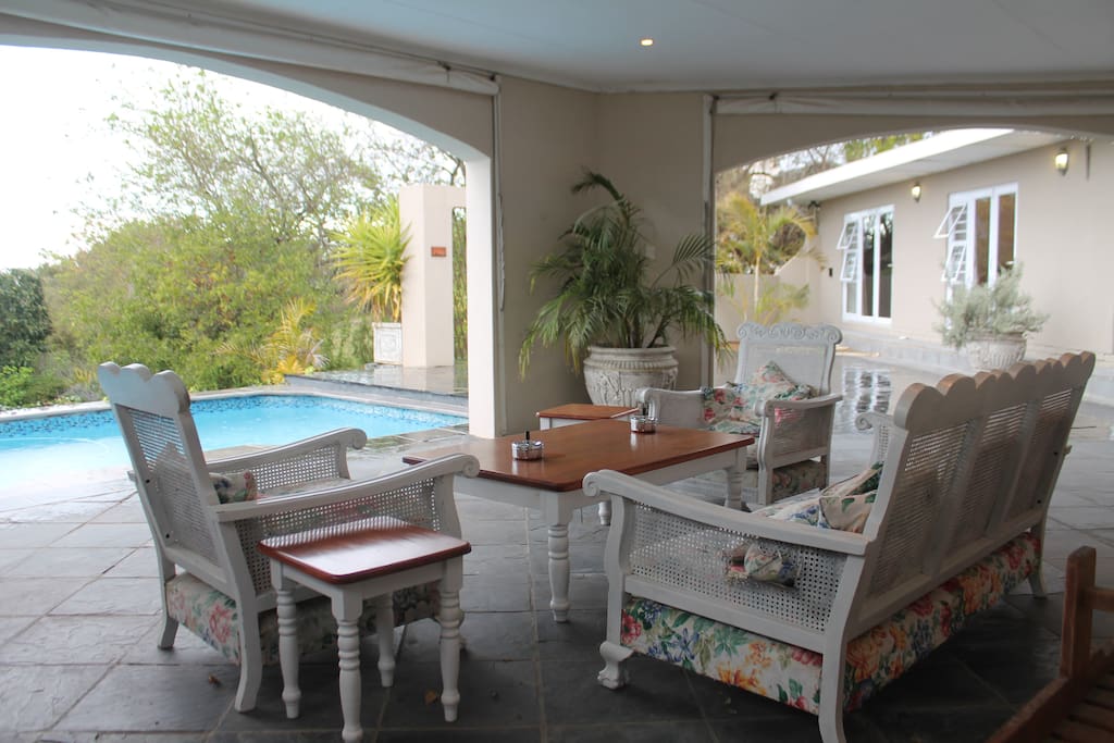 Outside sitting area with a braai place