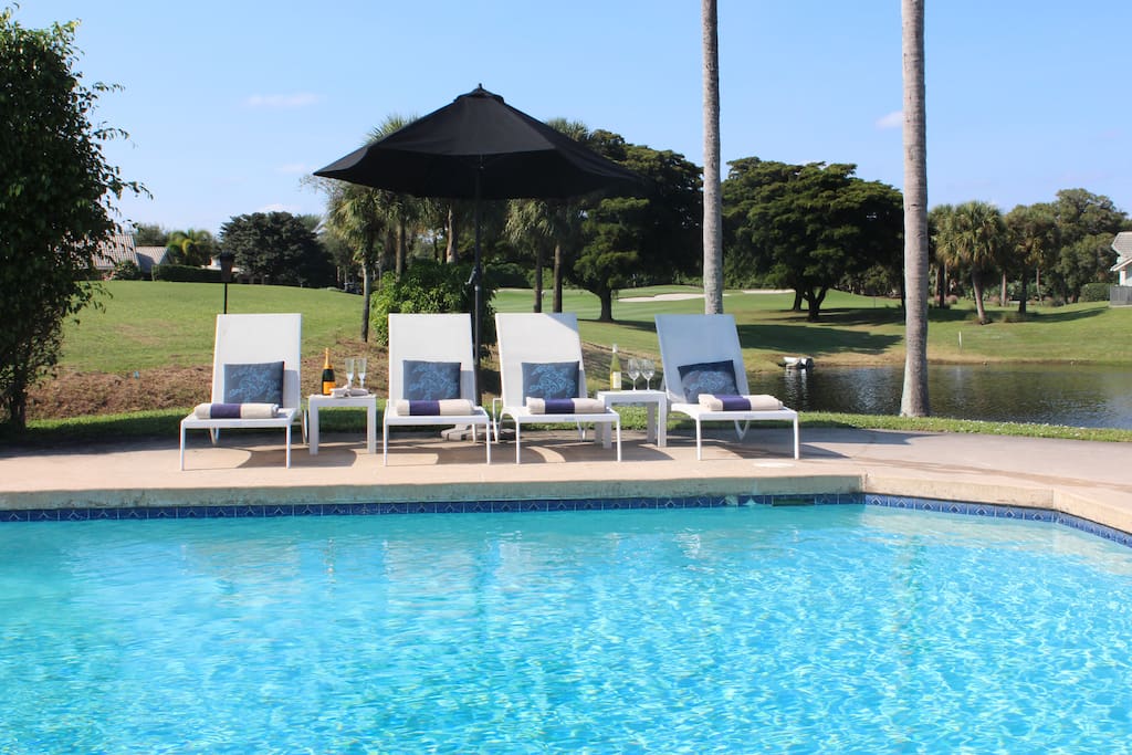 Pool overlooking 16th fairway and private lake