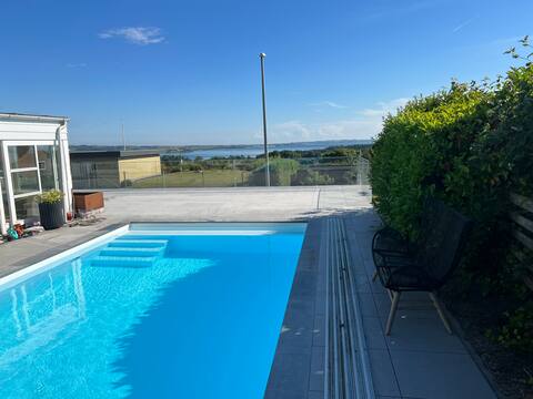 House with heated pool and stunning views of the bay
