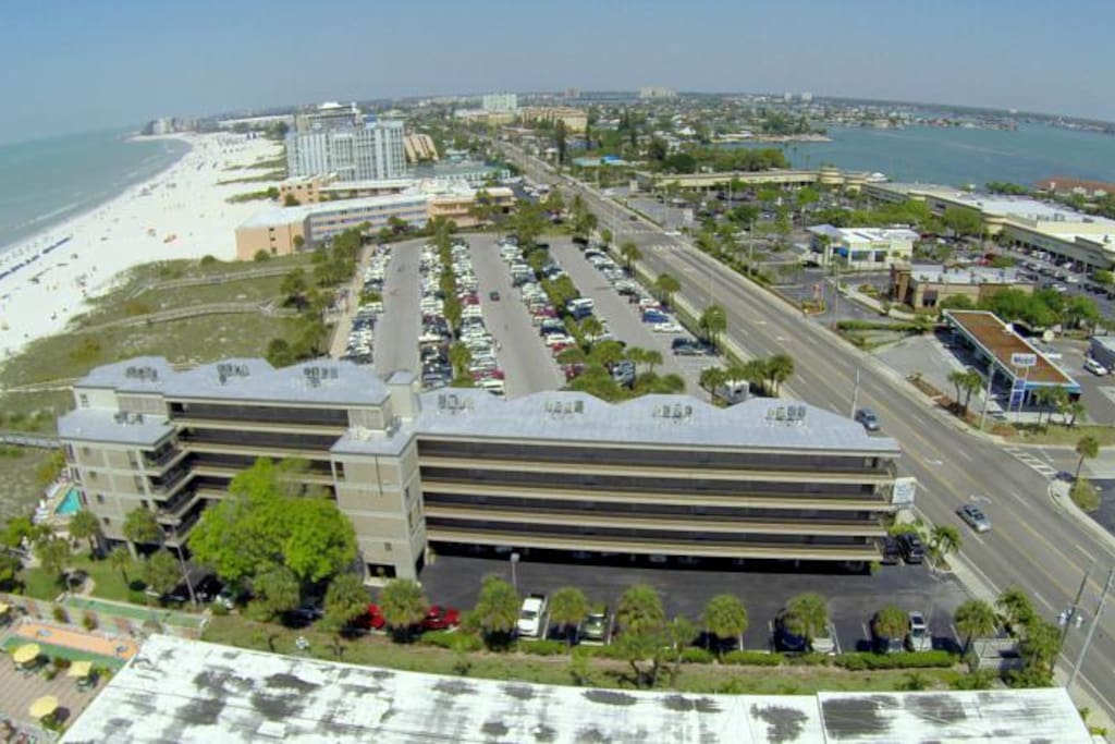 Aerial view of building's location on the beach.