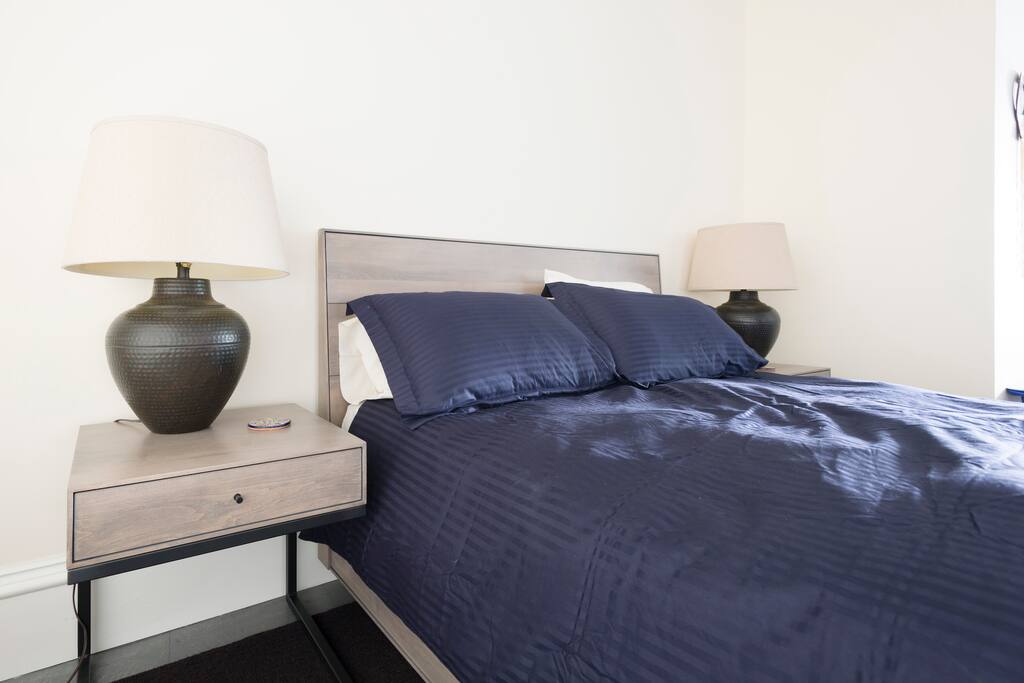 Comfortable queen bed to relax in.