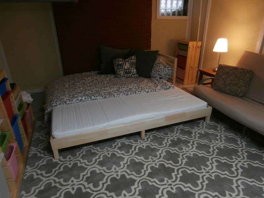 Daybed pulls out to sleep two.