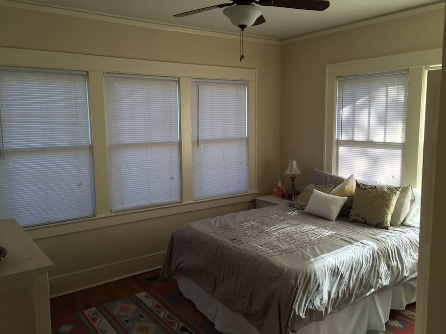 This is the available room with queen-sized bed, closet and drawer space, and right next to the private full bathroom.