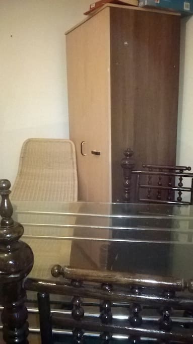 Glass dinning table and wardrobe