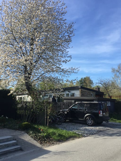 Private parking with direct access to garden and house.