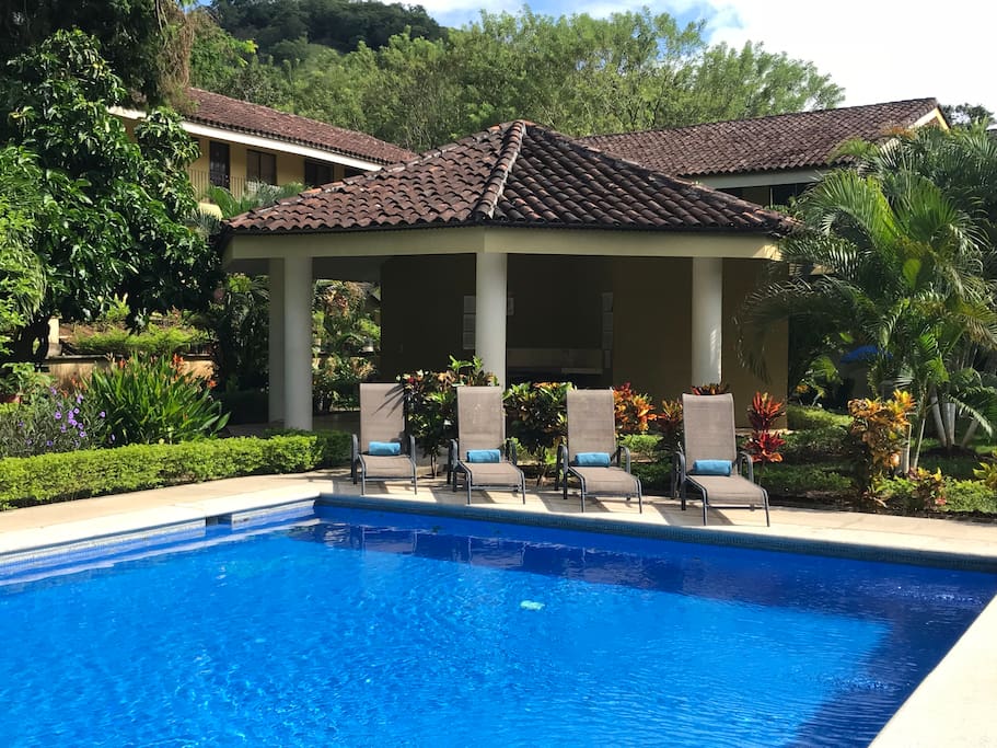 Pool-side loungers & shady Rancho