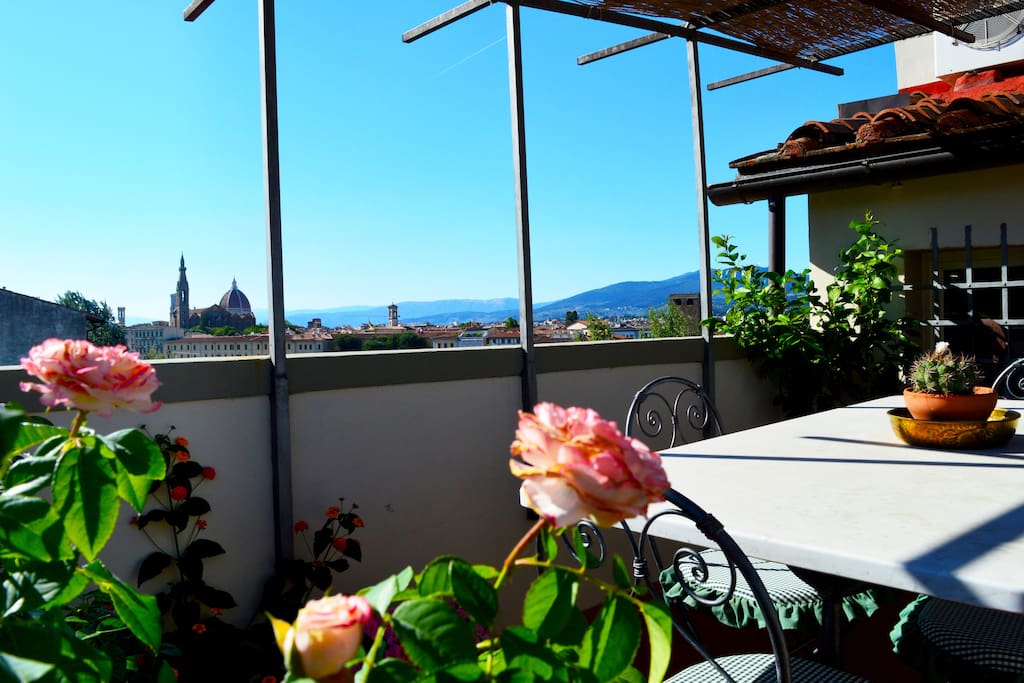 Terrace view of the Duomo of Florence with Roses