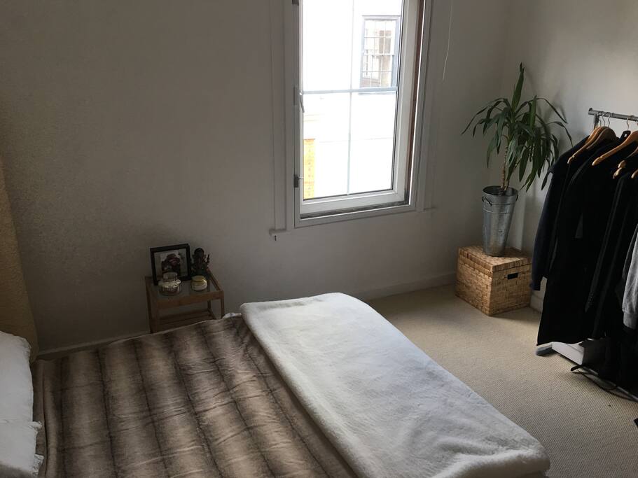 Bedroom, rails for hanging clothes.