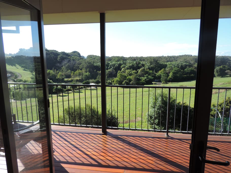 The balcony adjoins both rooms overlooking a nature reserve