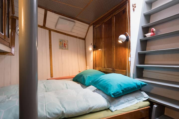 Unique room in bow of historic ship central R'dam