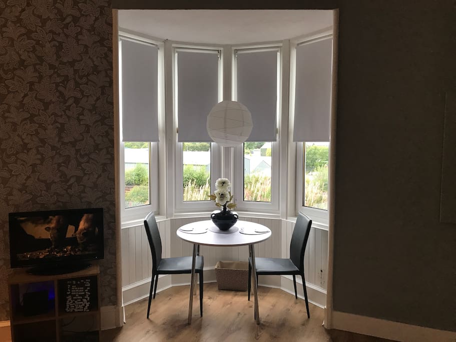 Charming period feature bay window dining area