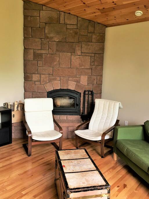 Living room with Island stone fireplace
