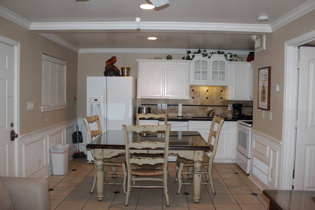 Full kitchen with dining room table