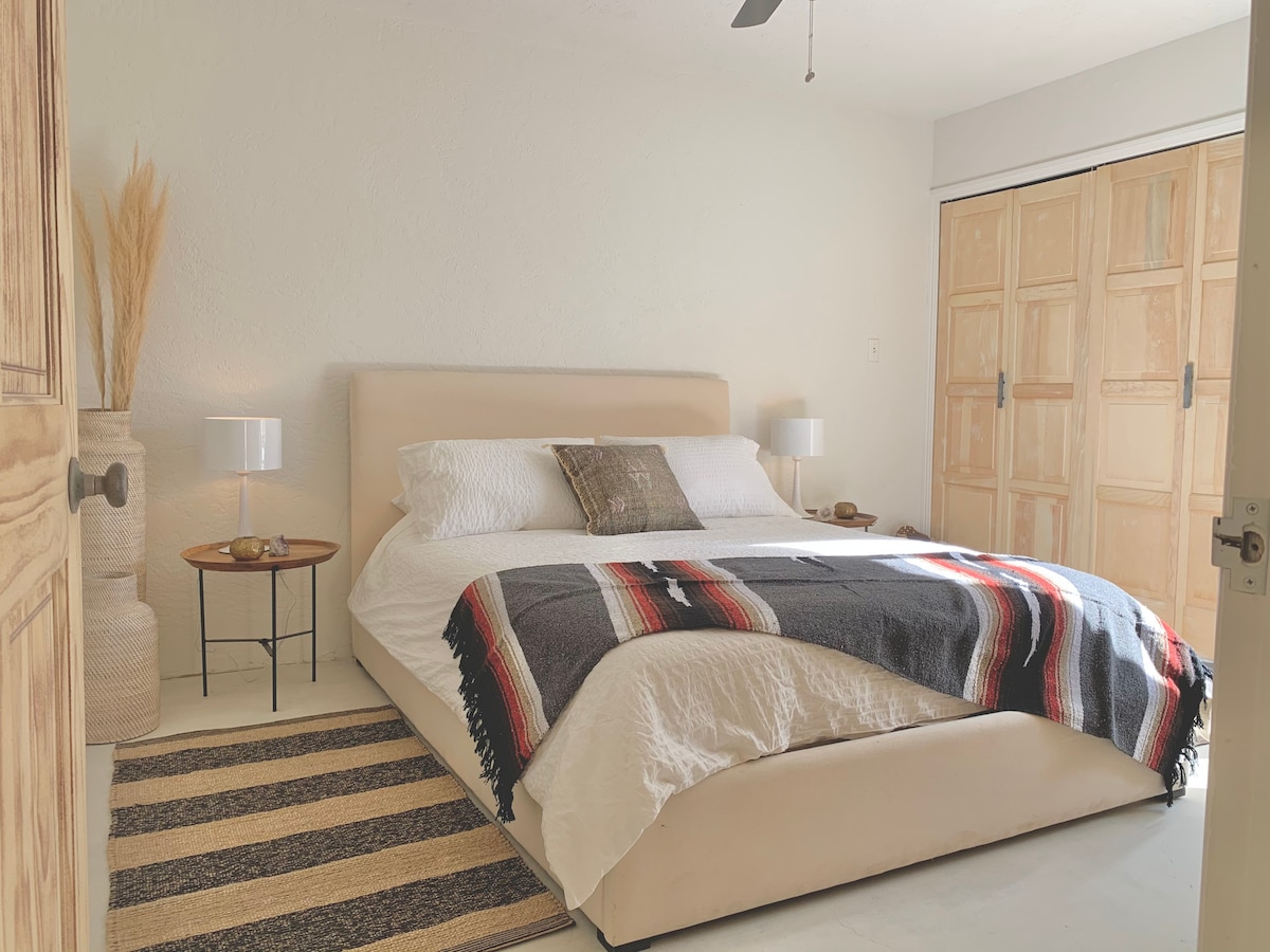 Bedroom 4 - queen bed in a bright and airy space. 