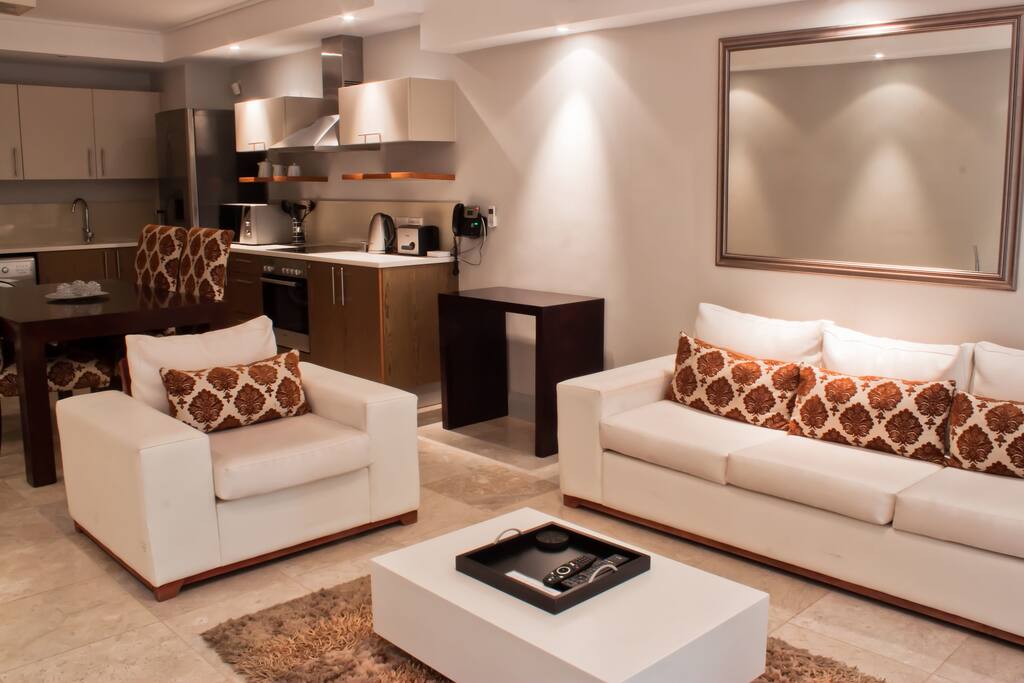 Living Room, Dining Area and Full equipped Kitchen