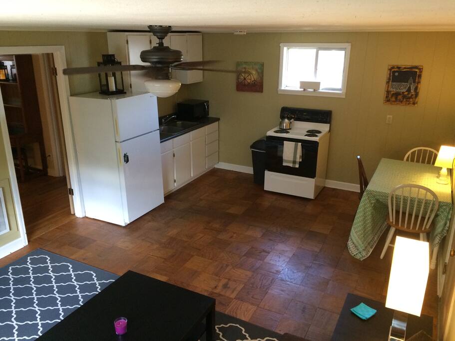 Full kitchen has everything you need to prepare snacks or full meals and a table to eat said meals
