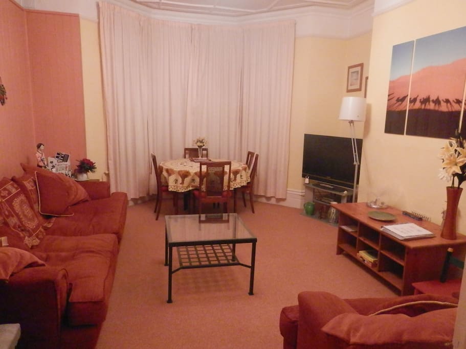 The lounge with bay window overlooking green conservation area