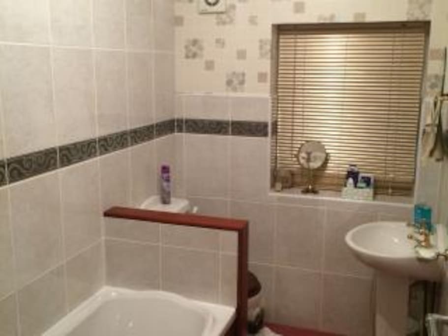 BATHROOM WITH BATH AND SHOWER