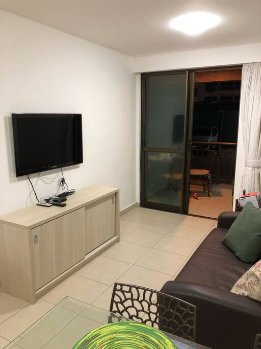 Sala com sofá cama